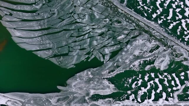 Winter aerial view featuring a frozen quarry in Dover, New Hampshire
