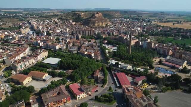 An Aerial panorama view beside the old town in the city of  Monzon on a sunny summer noon in Spain.