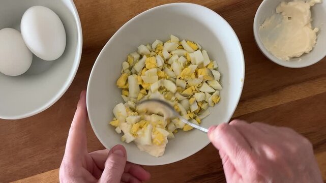Making Egg Salad in a Bowl