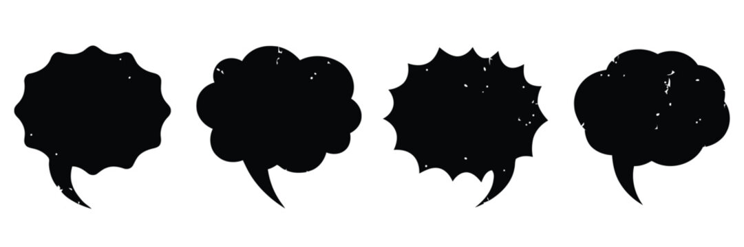 Four black ink blots on a white background