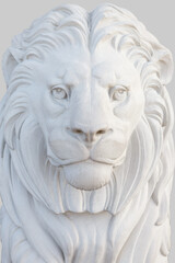 Fototapeta premium A white bas-relief depicting a lion's face with a mane