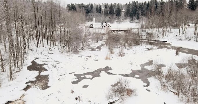 Aerial view of Vantaankoski rapids in cloudy winter weather, Vantaa, Finland, Europe.