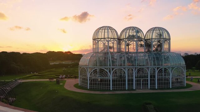Curitiba botanical garden glasshouse with Curitiba city horizon and Curitiba sunset