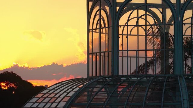 Curitiba botanical garden glasshouse with Curitiba city horizon and Curitiba sunset