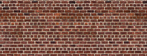 Fototapeta premium Red brick wall background – brickwall building backdrop with brown stone blocks. The file is a seamless texture, allowing the photo to be tiled.