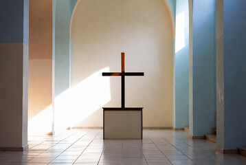 Fototapeta premium A wooden cross stands in a church interior, bathed in sunlight, creating a serene and contemplative atmosphere.