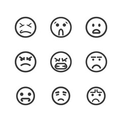Fototapeta premium Collection of simple round emoji expressions displaying negative sentiments