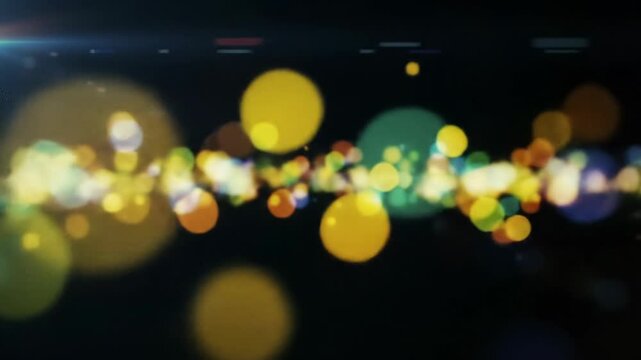 Luminous, softly diffused yellow, orange, green, blue, purple, red bokeh orbs subtly flow across an infinitely deep black background in a wide video with soft lens flares. Concept for digital flow