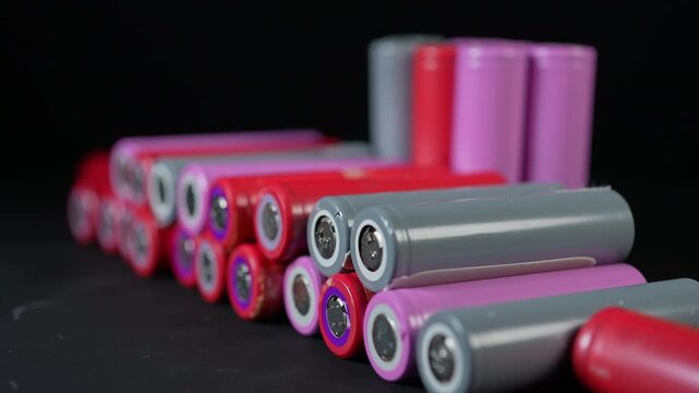 Sorting used batteries for recycling and reuse. Environmental protection and conservation. Safety and sustainability of electronic waste recycling process. AA silver batteries prepared for disposing