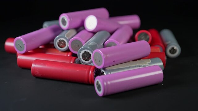 Sorting used batteries for recycling and reuse. Environmental protection and conservation. Safety and sustainability of electronic waste recycling process. AA silver batteries prepared for disposing