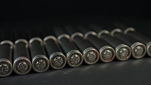 Large collection of AA batteries used in remote controls and computers laptops for cordless power. Disassembled and prepared for recycle. Environment conservation.