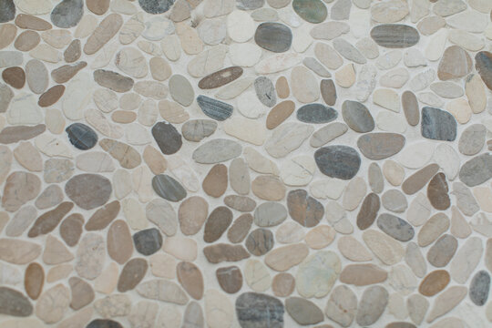 natural Pebble Stone with Shower floor with white grout lines 