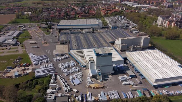 Aerial view of the industrial plant : An eye-level perspective showcases the architectural blueprint of an industrial plant, offering a glimpse into its operations and structure. 