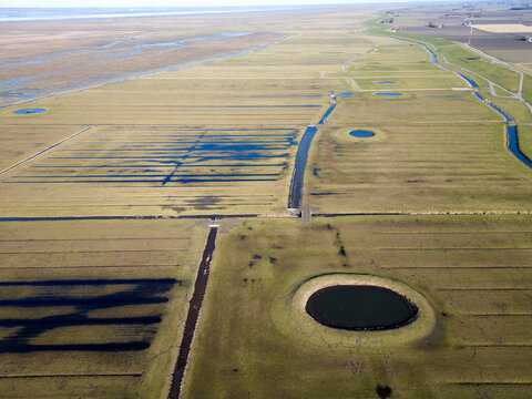 Aerial view of a traditional circular water reservoir or Dobbe water pond in Friesland, The Netherlands