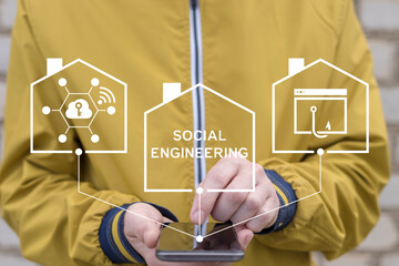 Concept of social engineering attack. Person using smartphone and virtual screen sees the text...