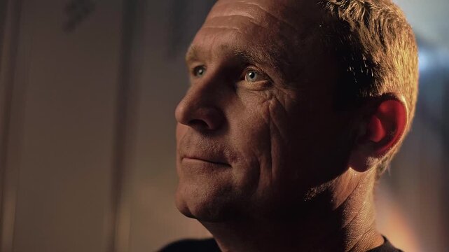 Enthusiastic, mature man with a nostalgic look on his face. Close-up. Portrait. Cinematic  