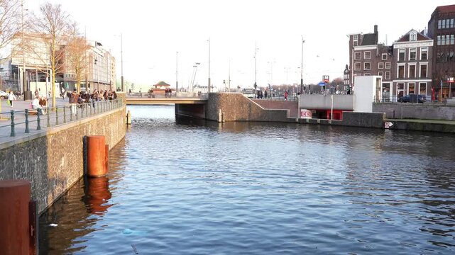 A view of the busy traffic above and below the Kamper bridge in the city centre of Amsterdam.