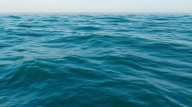 Vast blue ocean with gentle waves