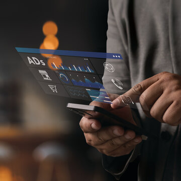 Business professional checking mobile advertising analytics dashboard on smartphone SEO Optimization, web analytics charts and campaign metrics. Concept of digital advertising management, media analyt