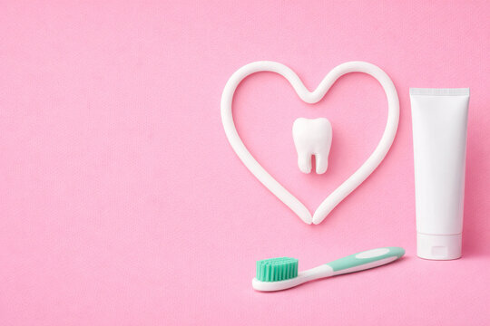 Dental oral care toothbrush toothpaste tooth heart pink background for hygiene clinic branding and dentist promotion ads