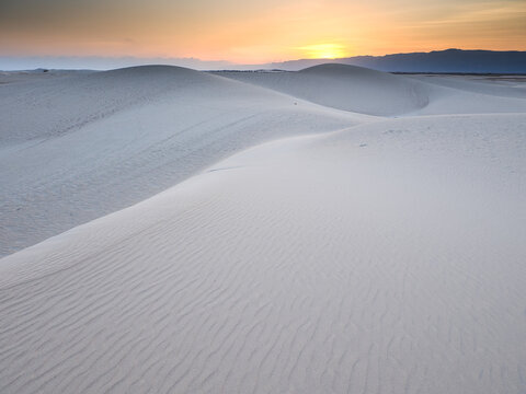 White sand dunes undulating at sunset on Socotra island, copy space