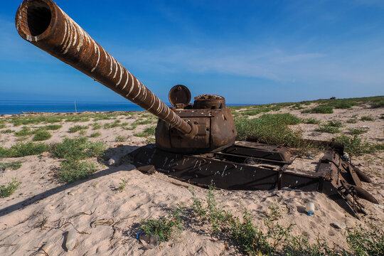 Rusty Abandoned Tank on Socotra Island Beach, copy space
