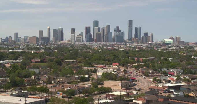 South Houston urban sprawl: Homes, businesses, and downtown skyline aerial 