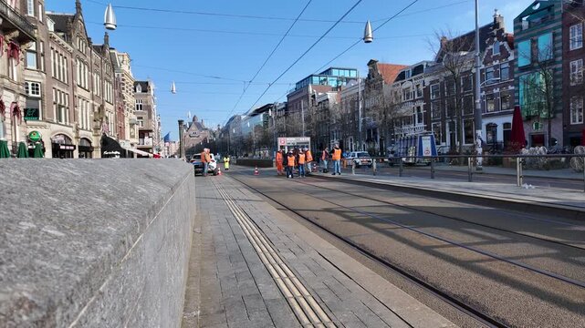 Maintenance work in progress at a tram stop in the city of Amsterdam.