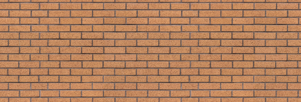 Brown block brick wall seamless texture background &ndash; unpainted brickwork pattern.
