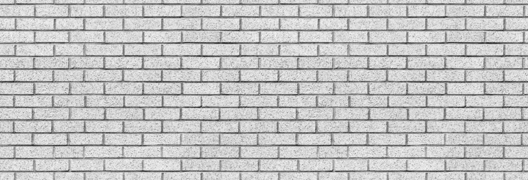 White brick wall seamless texture background. Concrete breeze block building pattern.
