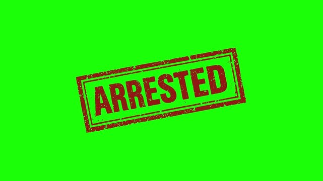 Red arrested stamp on green background for law enforcement concepts