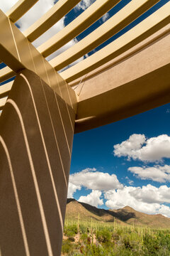 USA, Arizona, Tucson. shadows and light at play on the outdoor arbor at Saguaro National Park Visitor Center