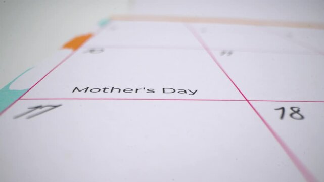 Close up of calendar showing Mother's Day date.