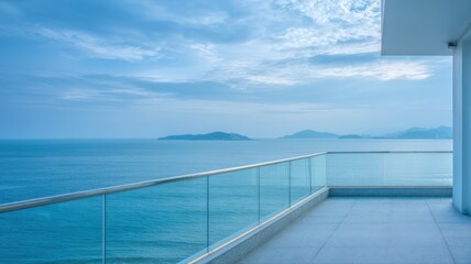 Naklejka premium Luxury Ocean View Balcony at Sunset with Modern Glass Railing and Tranquil Blue Horizon