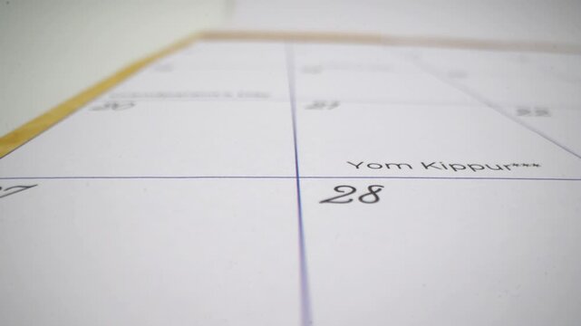 Close up of calendar showing Yom Kippur date.