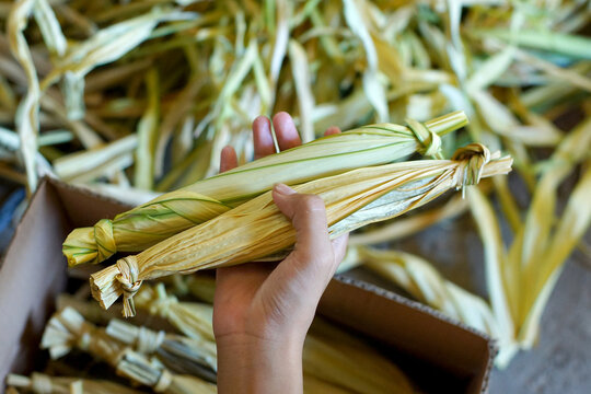 Dodol, or jenang, is a snack made from glutinous rice flour, coconut milk, and brown sugar, sometimes mixed with fruits such as durian and soursop, and wrapped in woka (Livistona rotundifolia) leaves.