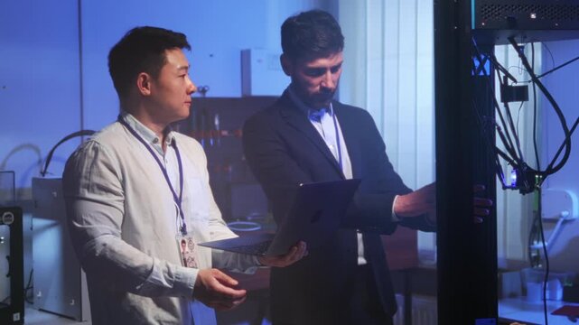 Futuristic laboratory scene involving engineers analyzing device performance and manufacturing standards