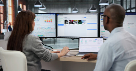Team Of Managers Collaboratively Monitors Real-time Ad Campaign Data © Andrey Popov
