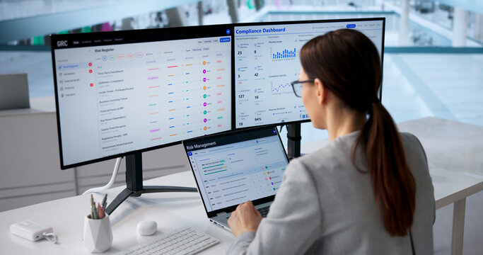 Young Female Analyst Conducting Risk Evaluation And Policy Strategy