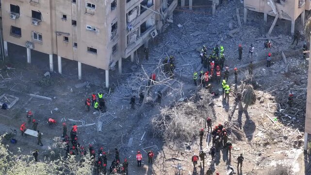 Aerial view Holon Iranian missile strike destruction Israel

Drone footage showing rescue teams at missile impact site in Holon residential area Israel June 14 2025
