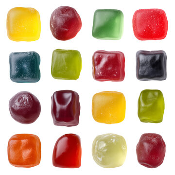 An appealing grid of sixteen assorted colorful square and round gummy candies on black. isolated on transparent background
