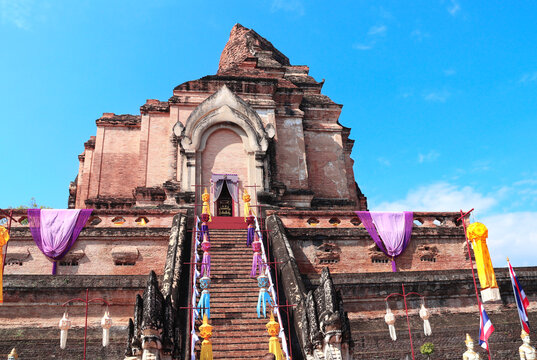 Famous sightseeing landmark - Wat Chedi Luang Temple in Chiang Mai, Thailand. Wat Chedi Luang is a Buddhist temple in historic center of Chiang Mai. Topic of vacation, travel, trip, cruises, tour
