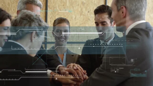 Seven business team bringing hands together in room, HUD over faces not hiding hands showing unity