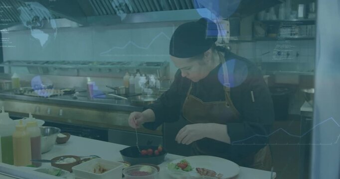 Kitchen service cue, chef plating tomatoes on white pass with tongs, blue glass overlays over chef