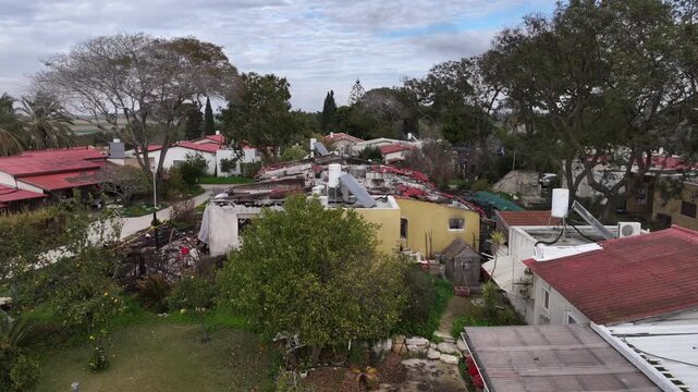 Aerial Kfar Aza burned house aftermath Israel

Drone footage burned home destruction aftermath Kfar Aza Israel October 7 2024
