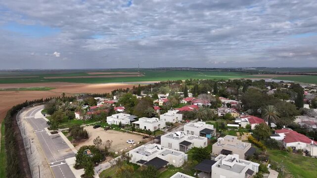 Aerial Kfar Aza kibbutz homes neighborhood Israel

Drone footage residential area Kfar Aza kibbutz Israel October 7 2024
