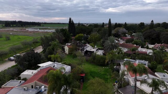 Aerial Kfar Aza kibbutz homes neighborhood Israel

Drone footage residential area Kfar Aza kibbutz Israel October 7 2024
