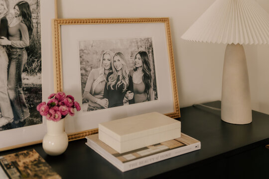 Cozy home decor with framed family portrait