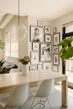 Bright dining room with gallery wall decor