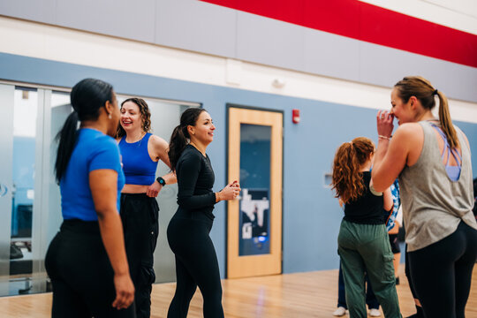 Diverse women enjoying group fitness class activity